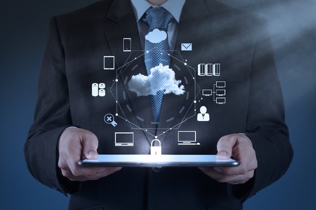 Businessman hand working with a Cloud Computing diagram on the new computer interface as concept.jpeg